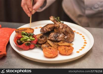 grilled duck legs with vegetables. grilled duck legs