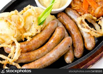 grilled frankfurters, potatoes, onion rings in batter, solyanka and mustard