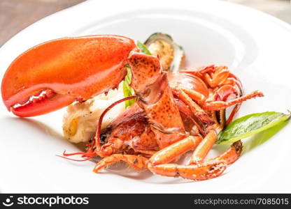 Grilled Halved Lobster Tails with mussel and calamari