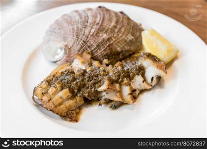 grilled Japanese Abalone steak with lemon