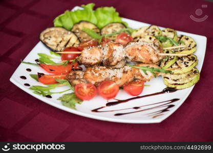 Grilled kebab pork meat. Grilled kebab pork meat with roasted potato and vegetables