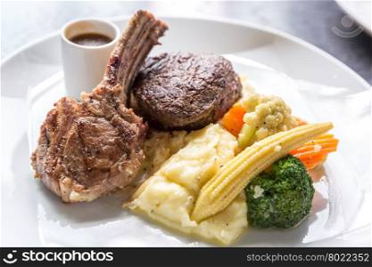 Grilled Lamb steak with mashed potato and vegetable