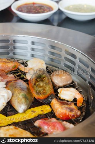 grilled meat and mix seafood , bbq cooking