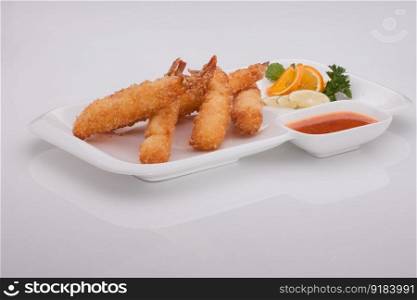 grilled meat in a square plate on a white background. grilled meat on a plate