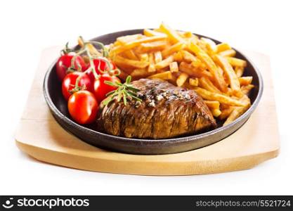 grilled meat with french fries in a pan on white background