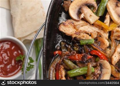 grilled meat with mushrooms and vegetables