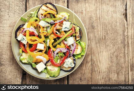 Grilled pepper, eggplant and zucchini salad.Vegetable grilled salad.Fried vegetables. Grilled vegetables salad