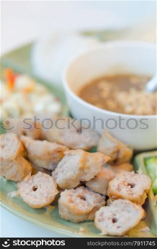 Grilled pork balls with condiments and Peanut Sauce , Vietnamese cuisine