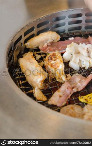 grilled pork, chicken and mix seafood