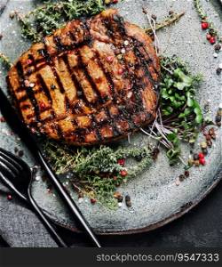 Grilled pork chop dish with spices on a plate