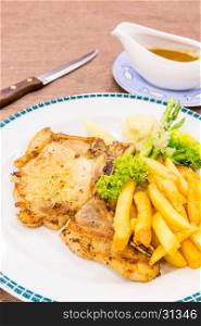 grilled pork chops with french fries