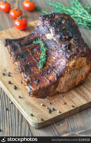 Grilled pork ribs on the wooden board