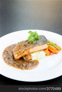 grilled salmon steak with pepper sauce