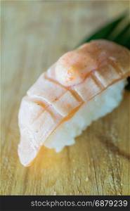 Grilled salmon sushi , japanese food style on wood