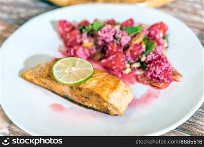 Grilled Salmon with raspberry top with lime