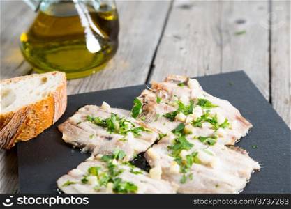 Grilled sardines with garlic and parsley