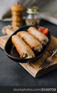 Grilled sausage on pan close up