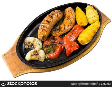 grilled sausages, potatoes and paprika, isolated