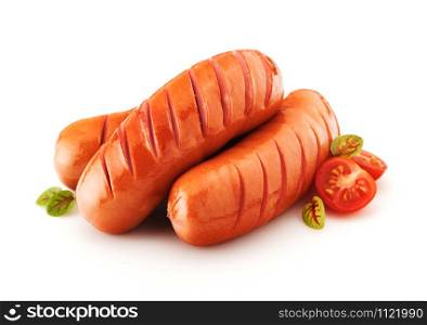 Grilled sausages with herbs and tomato isolated on white background
