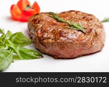 Grilled steak on a white plate. Grilled Steak