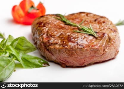 Grilled steak on a white plate. Grilled Steak