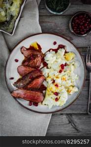 Grilled steak with cauliflower and pomegranate