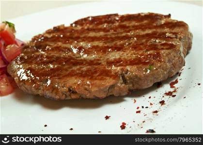 grilled t-bone beef steak and vegetables