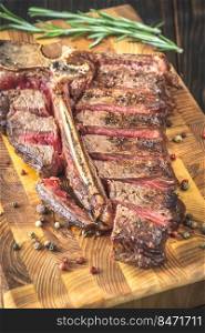 Grilled T-bone steak on the cutting board