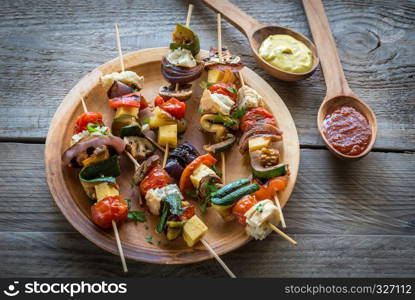 Grilled vegetable skewers on the plate