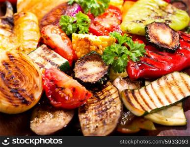 grilled vegetables on wooden board