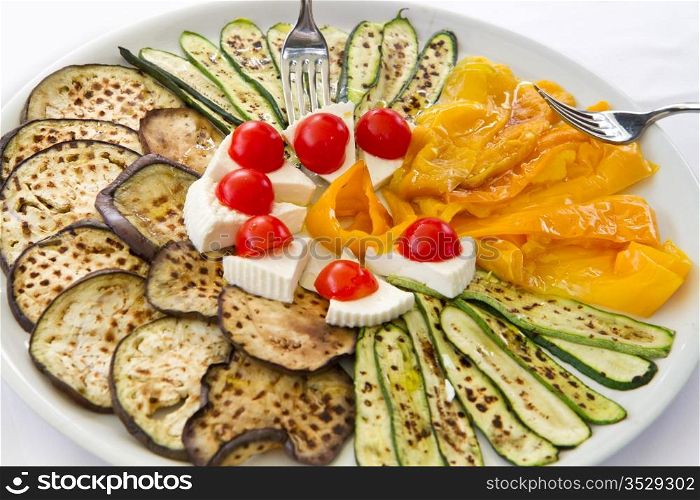 grilled vegetables with tomatoes and cheese