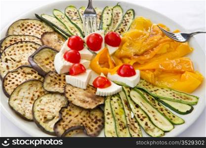 grilled vegetables with tomatoes and cheese