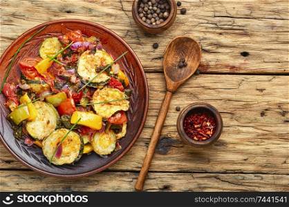 Grilled zucchini in Greek.Greek cuisine.Steamed vegetables.Summer food. Grilled zucchini in Greek