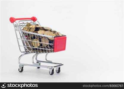 Grocery shopping cart filled with coins