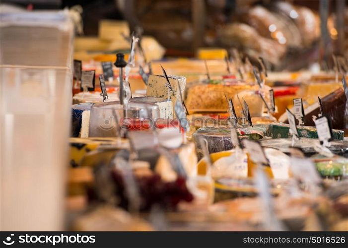 Grocery store. Cheese glass case closeup