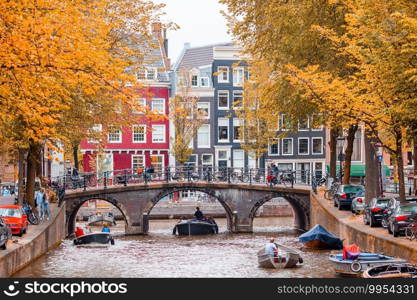 Groenburgwal canal in the old city of Amsterdam, Netherlands, North Holland province.. Beautiful canal in the old city of Amsterdam, Netherlands, North Holland province.