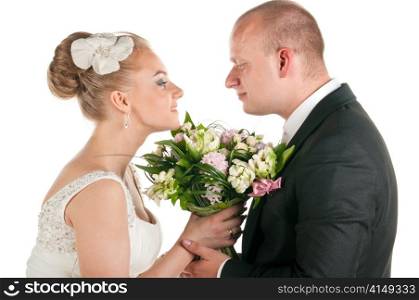 groom and bride are holding bridal bouquet, cut out from white