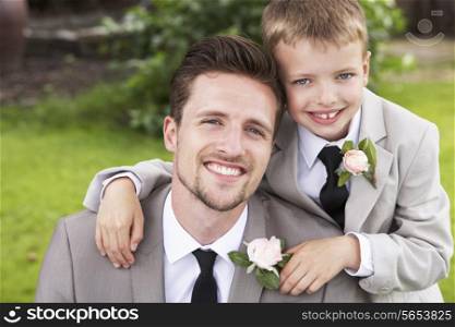Groom With Page Boy At Wedding