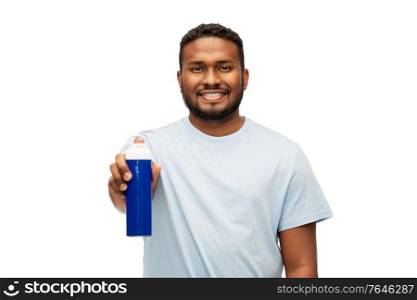 grooming and people concept - happy african american man showing shaving foam to camera over white background. happy african man showing shaving foam to camera