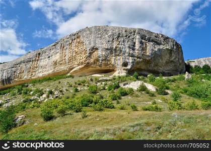 grotto in the rock Kachi Kalyone Crimea, Ukraine, summer day
