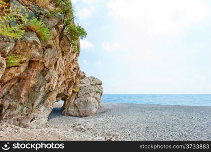 grotto in the rock on the sea beach