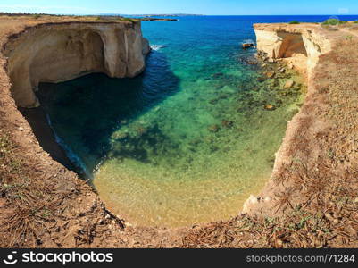 Grottoes on Spiaggia Massolivieri beach. Summer sea landscape (Siracusa, Sicily, Italy). Four shots stitch high-resolution panorama.