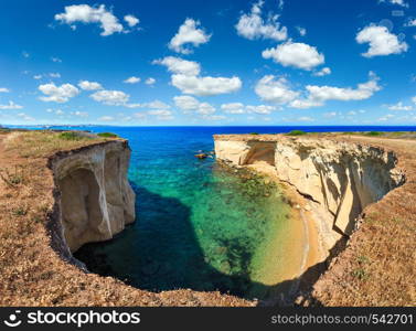 Grottoes on Spiaggia Massolivieri beach. Summer sea landscape (Siracusa, Sicily, Italy). Two shots stitch panorama.