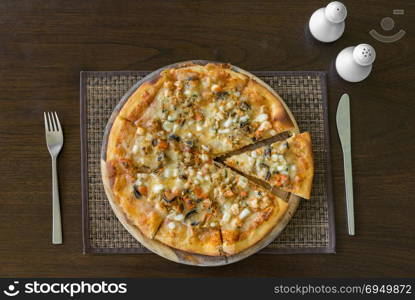 Groumet Seafood Pizza wooden table