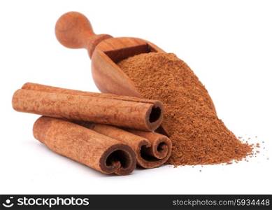 ground cinnamon spice powder in wooden spoon isolated on white background cutout