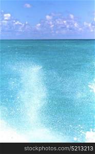 ground in mexico froath and blue foam the sea drop sunny day