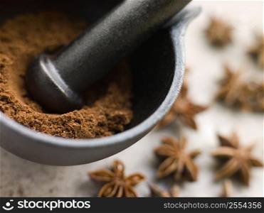 Ground Star Anise in a Pestle and Mortar