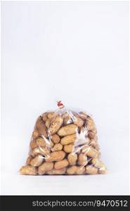 Groundnuts packed in a transparent plastic bag. 