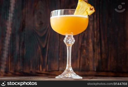 Grounds For Divorce Cocktail garnished with pineapple wedge