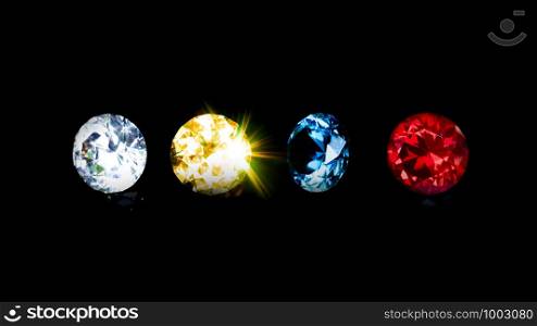 Group beautiful diamond at blue red yellow and clear on isolated black background